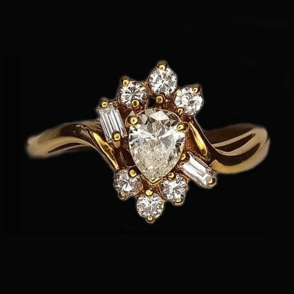 Yellow gold pear shaped diamond engagement ring baguetteNew